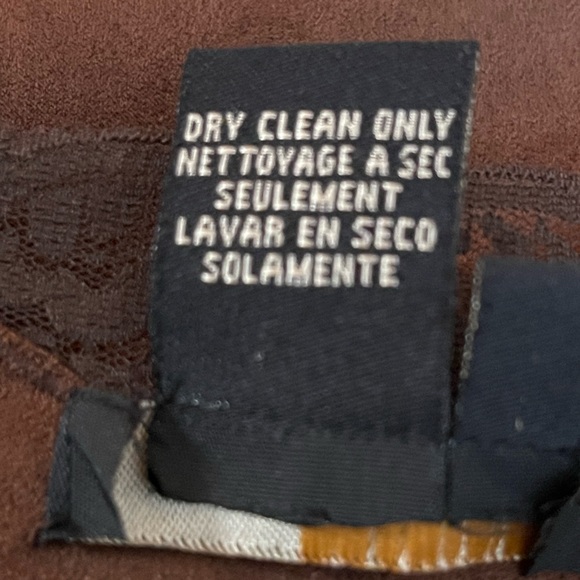 BCBG Maxazria Fuax leather top. Polyester and spandex gives stretch - Picture 6 of 7